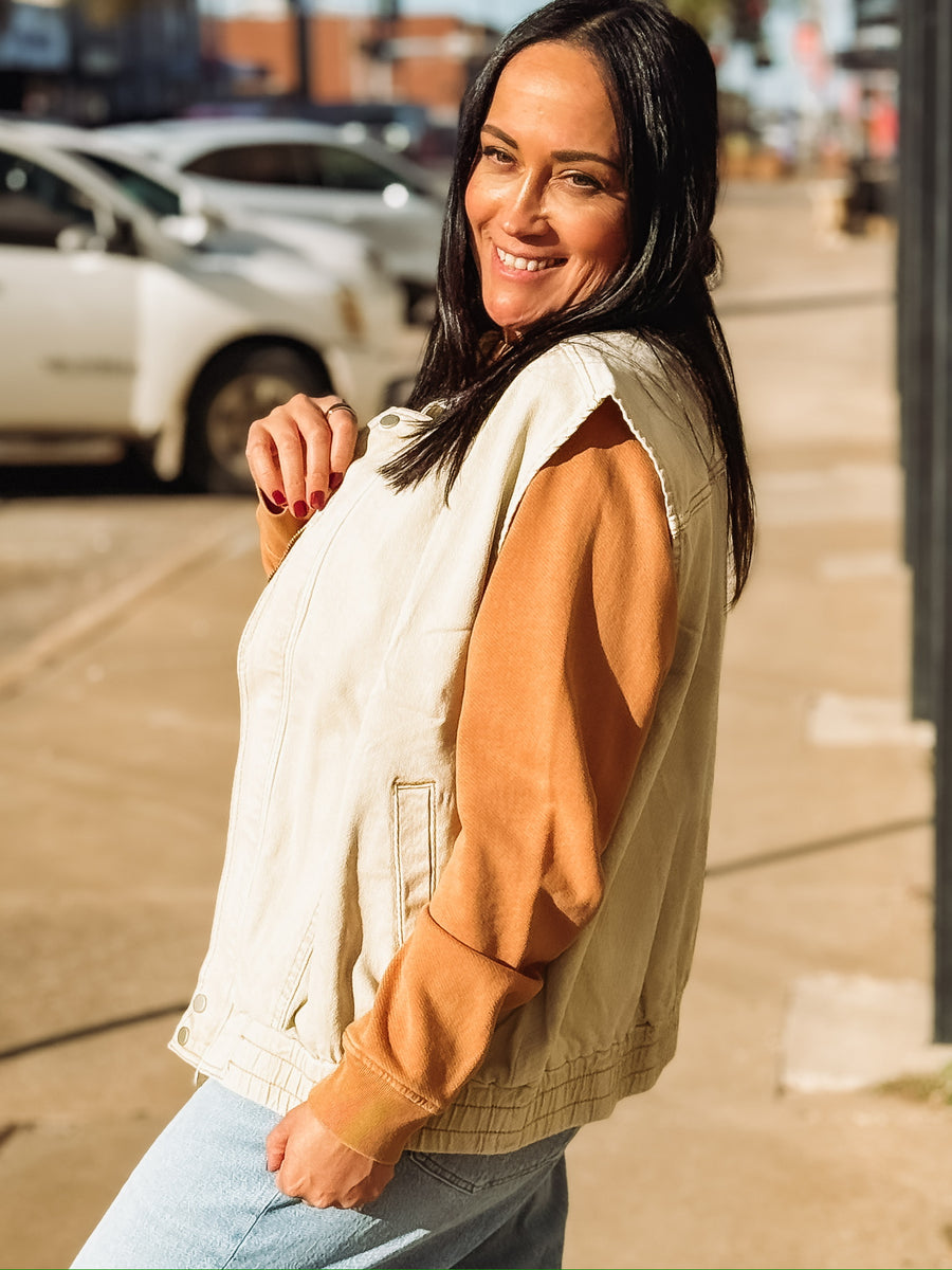 Washed oversized denim oat colored zip up vest.