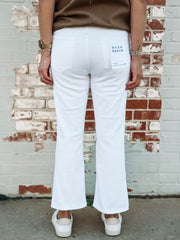 White cropped flare jeans by Daze