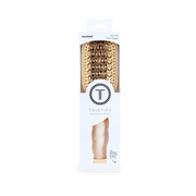 Packaged hairbrush with Teleties branding on a white background