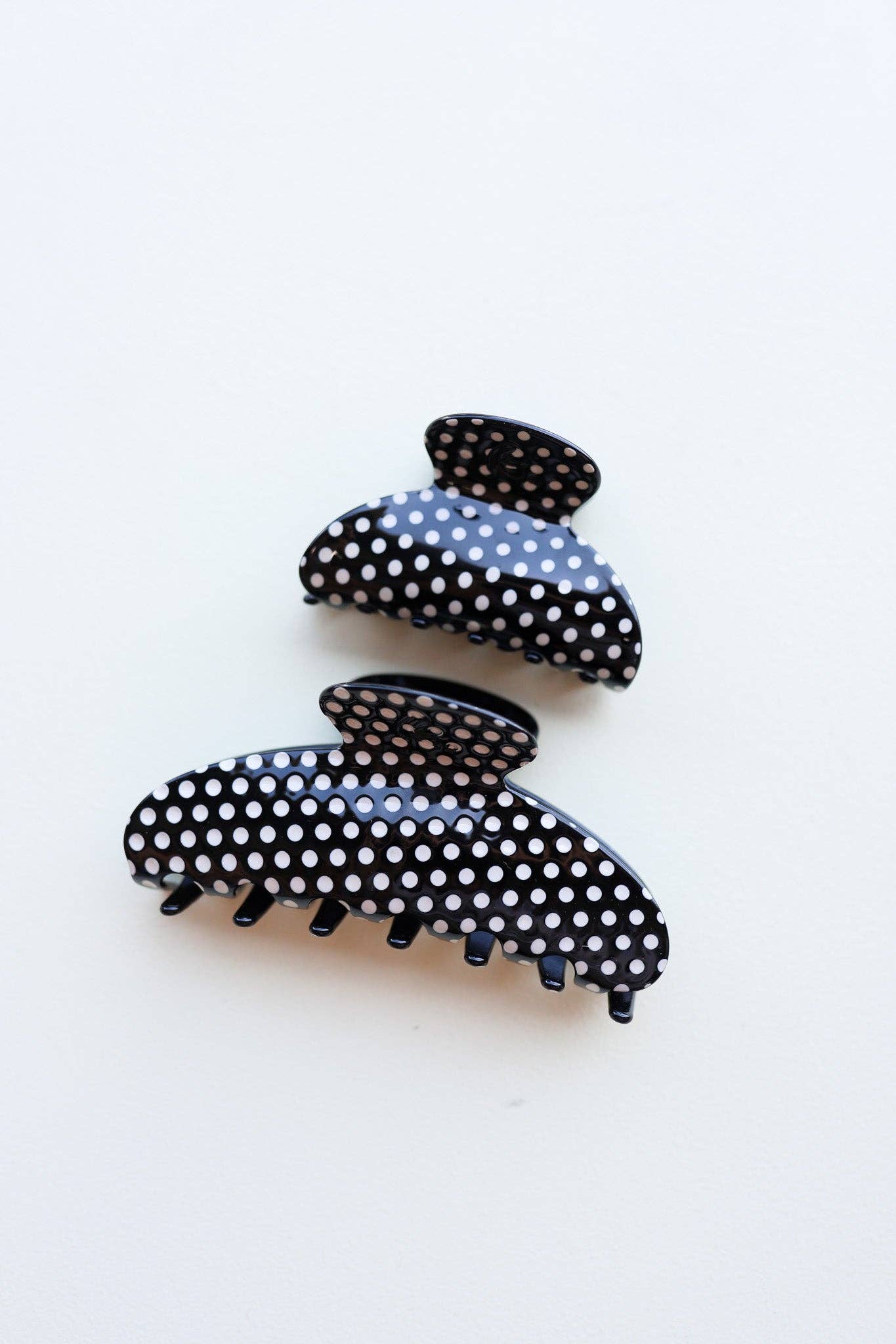 hair clips with black base and white polka dots