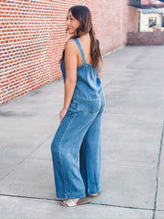 Sleeveless denim top paired with matching wide leg trouser in a relaxed two piece outfit.