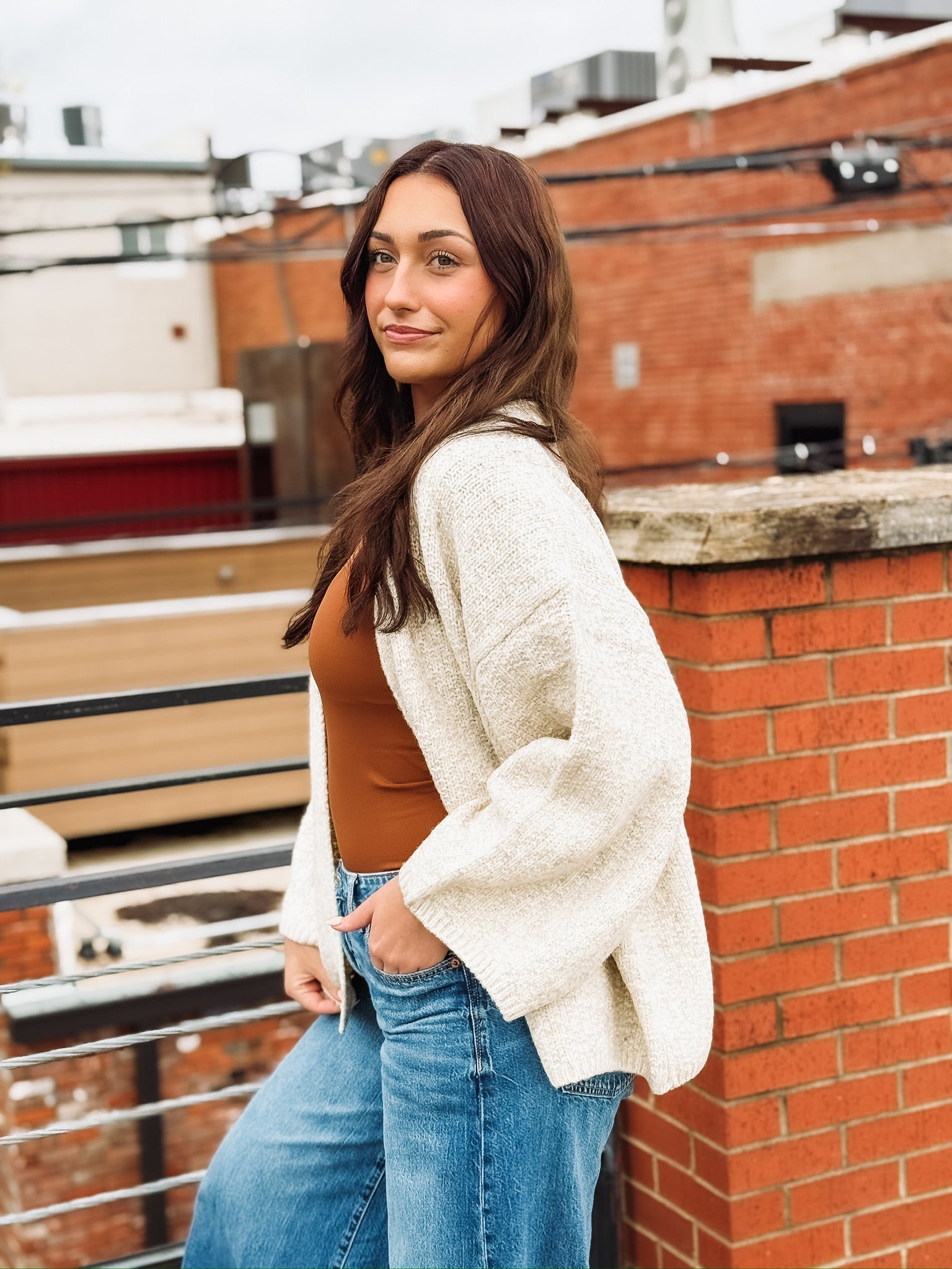 Soft, bubble-cut open-front cardigan with relaxed billowy sleeves and a cozy, refined texture.