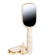 Beige paddle hairbrush with gold accents 