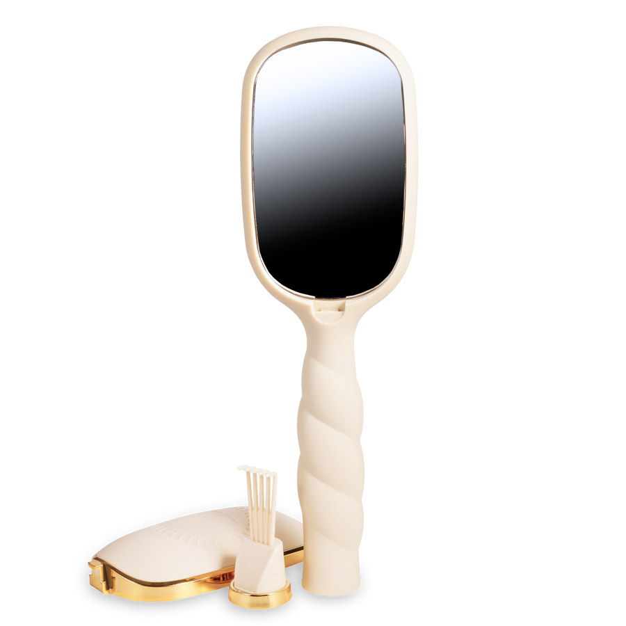 Beige paddle hairbrush with gold accents 