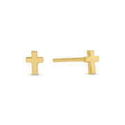 Gold cross-shaped earrings on a white background