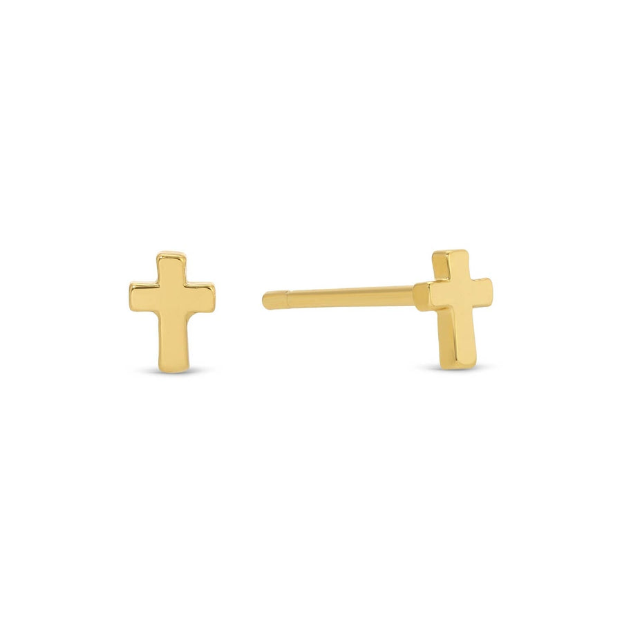 Gold cross-shaped earrings on a white background