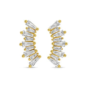 Gold and diamond earrings on a white background