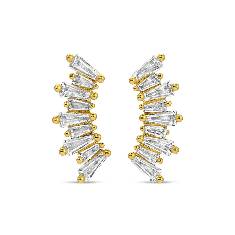 Gold and diamond earrings on a white background