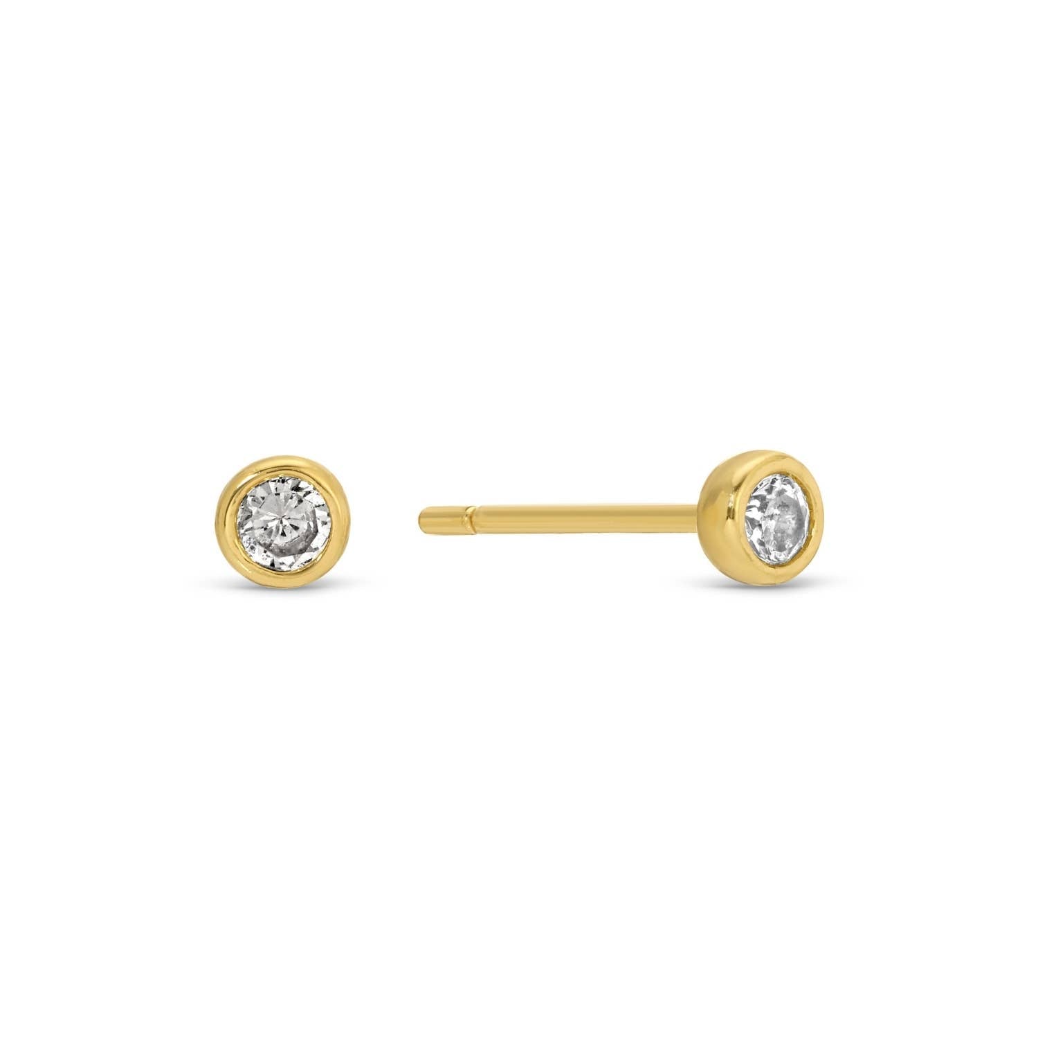 Gold stud earrings with clear gemstones on a white background
