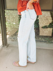 Straight leg light wash denim jeans in first sight vintage by Daze.