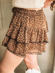 Leopard drawstring ruffle shorts with black lace trim.