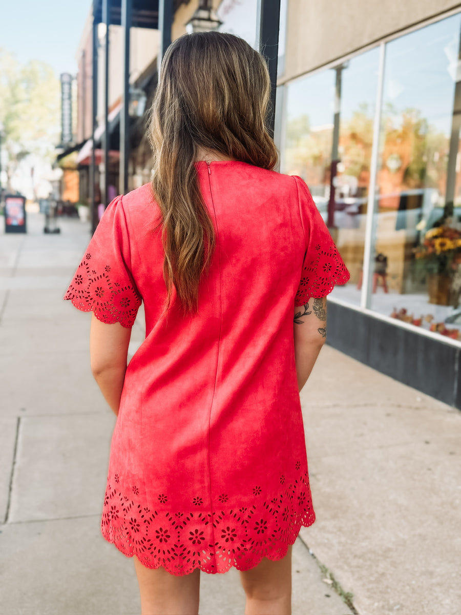 Tomato red short sleeve mini dress with eyelet detailing on the hem and sleeves. 