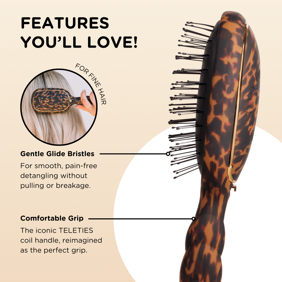 Tortoise print hairbrush with features highlighted on a beige background