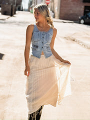 Feminine cream lace skirt featuring delicate embroidery and layered ruffles