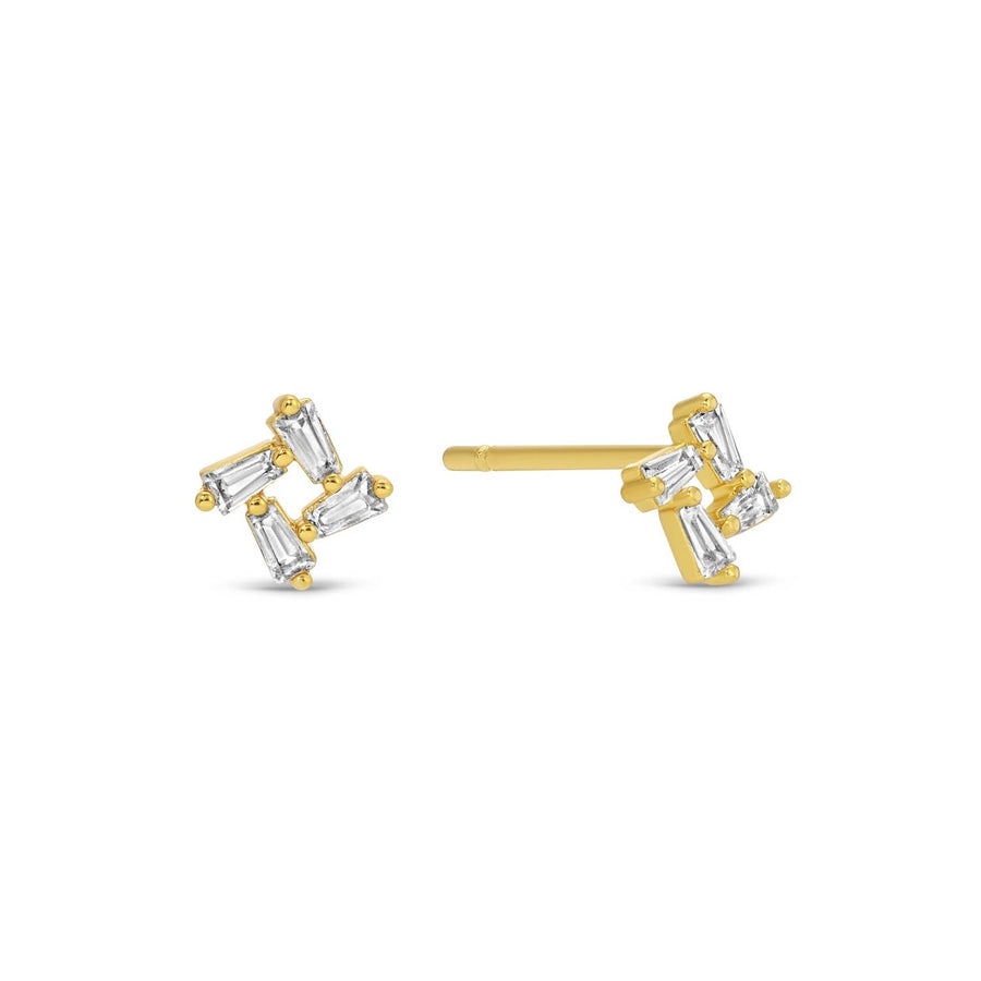 Gold and pave stud earrings on a white background