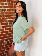 green short sleeve modal top.