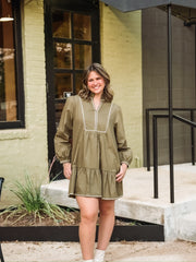 Olive tiered Hem long sleeve mini dress with cream contrast seaming.