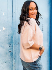 Light pink soft short Drop sleeve button up cardigan with large tortoise shell buttons.