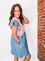 Mixed media dress with red and white stripes along the bust and a denim base with ruffle detail.
