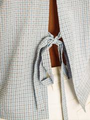 Cropped plaid button up long sleeve with slit tie detail in the back.