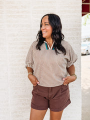 brown and white striped short sleeve dolman top with a v neck line and contrast seaming.