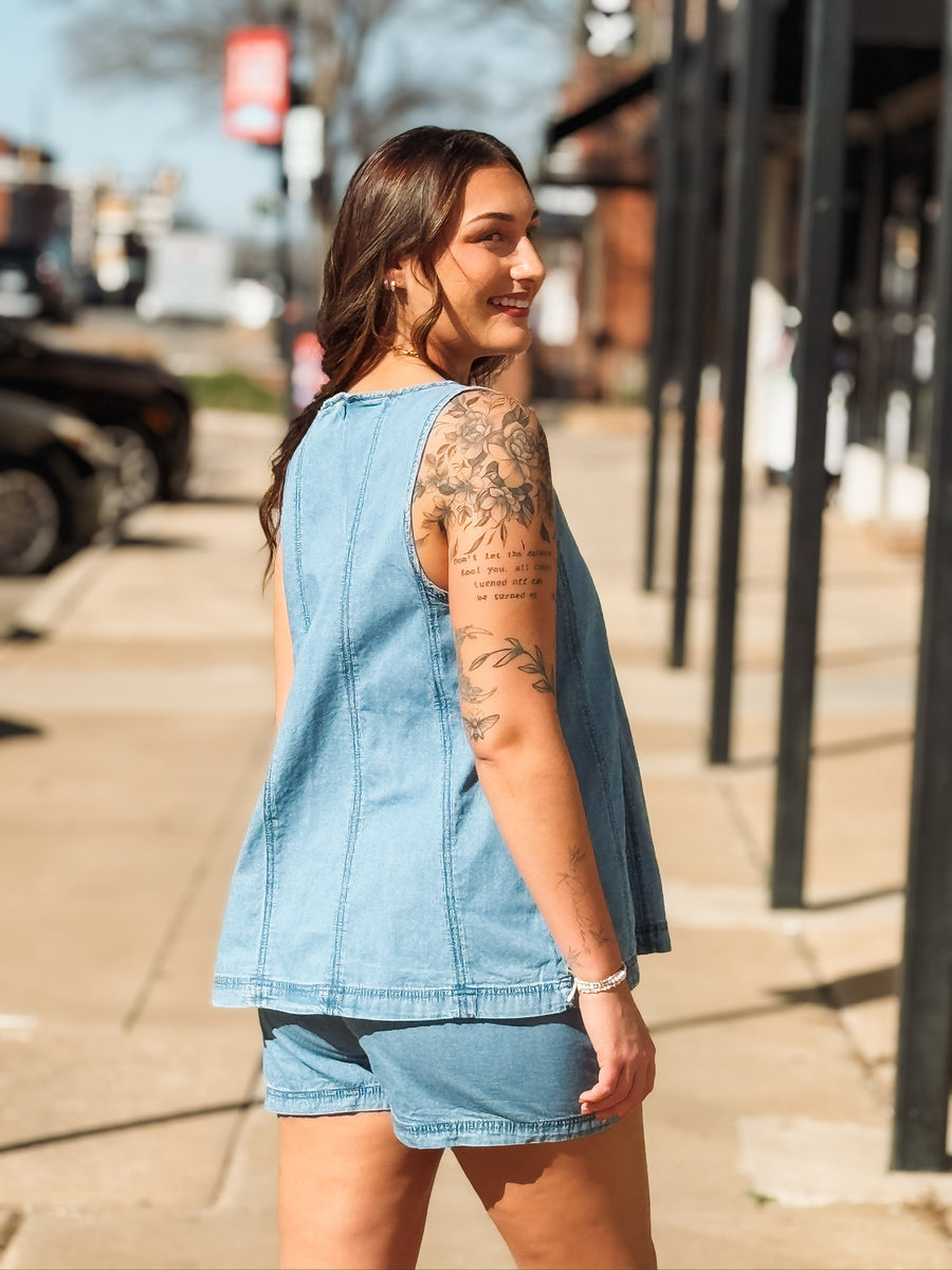 Two piece denim short set with high neck tank top.