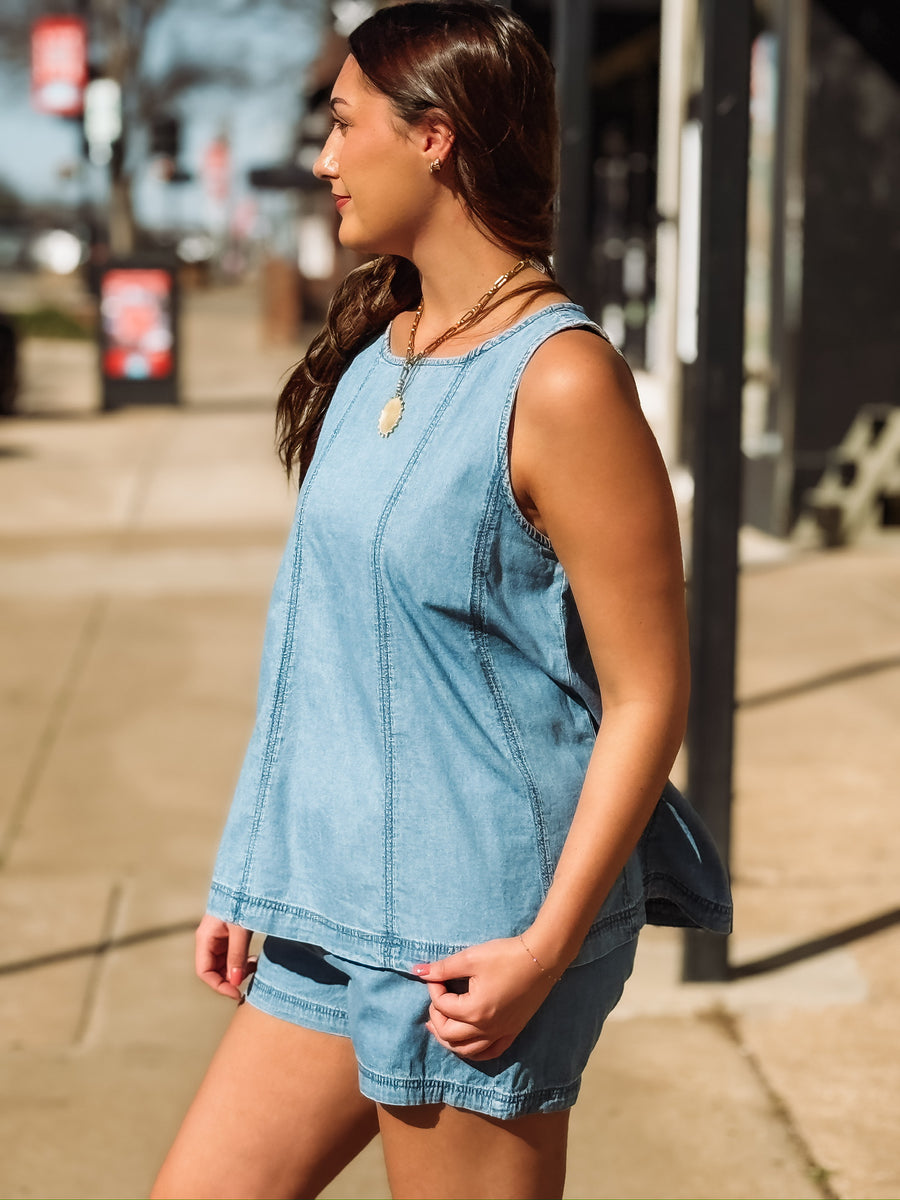 Two piece denim short set with high neck tank top.