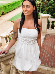 White spaghetti strapped bubble mini dress.