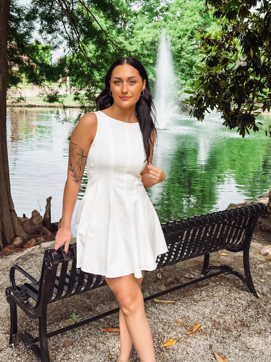 White sleeveless tank dress with seaming by Steve Madden.