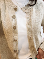 Ecru button up long sleeve cardigan with wooden detailed buttons.