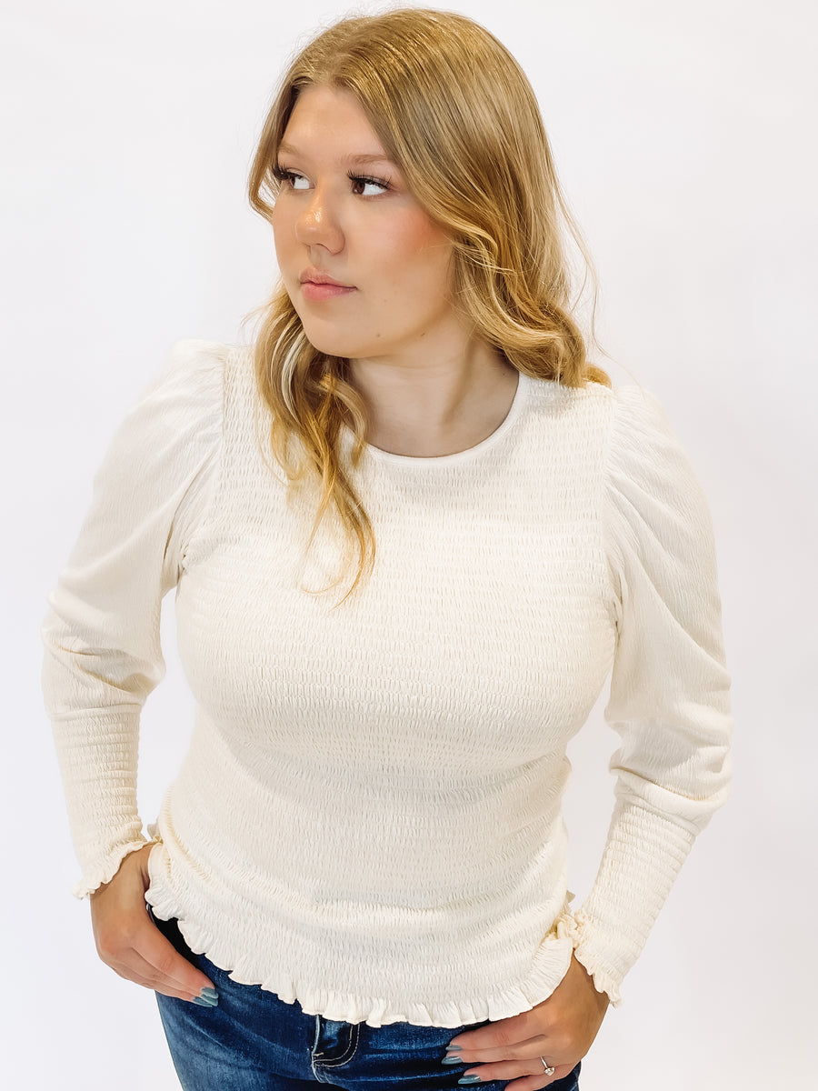 White smocked long sleeve