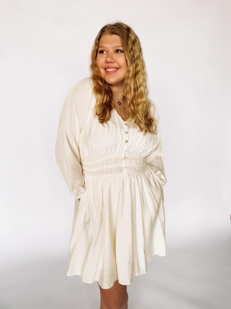 white ballon sleeved dress