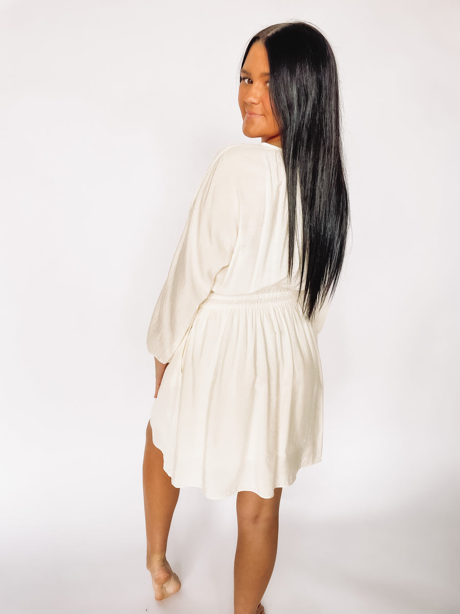 white ballon sleeved dress